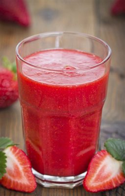 Vaso de jugo de fresa
